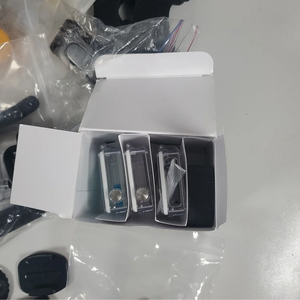 GoPro Hero4, Two Batteries, And Accessories Lot. Mounts, Body And Head Harness